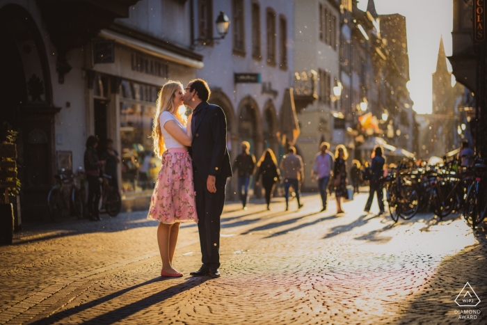 Photo by: <a href="https://www.wpja.com/photos/diamond-award-top-wedding-engagement-photographer/2545574">David Anton - Oberkirch Strasbourg pre wedding shoot with couple and backlight in the middle of the street