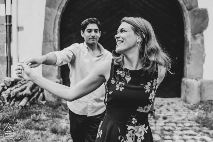 Photo by: <a href="https://www.wpja.com/photos/diamond-award-top-wedding-engagement-photographer/2545577">David Anton - Oberkirch Allerheiliger Wedding and Engagement Photography - Photo of a Couple dancing in front of the wood door