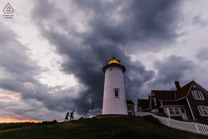 Photo by: <a href="https://www.wpja.com/photos/diamond-award-top-wedding-engagement-photographer/2545875">Alex Paul - Boston Massachusetts Nobska Lighthouse, Falmouth, MA engagement portrait session at sunset