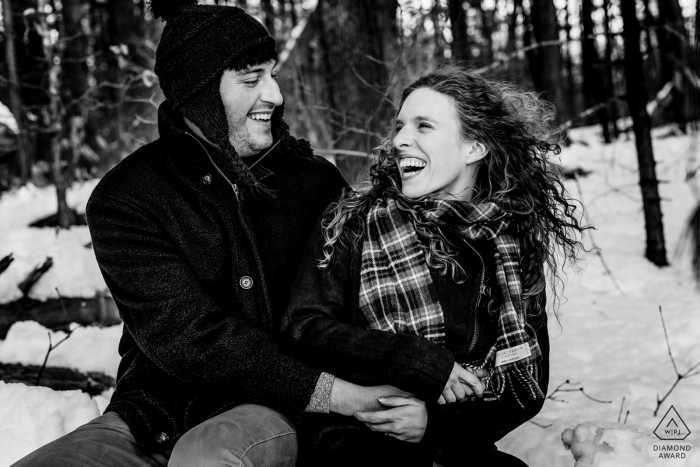 Photo by: <a href="http://www.wpja.com/photos/diamond-award-top-wedding-engagement-photographer/2546880">Sarah V. Martinez - Dover New Hampshire The Fells Reserve Massachusetts Pre Wedding Portraits - The engaged couple laughs together at their winter engagement session in the Fells Reserve