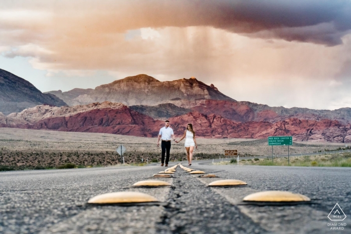Photo by: <a href="https://www.wpja.com/photos/diamond-award-top-wedding-engagement-photographer/2547261">Eric Corbacho - São Caetano do Sul São Paulo Engagement Photographer for Red Rock, Nevada | The road lines lead the eyes straight to the couple