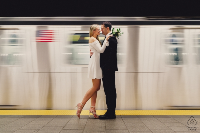 Photo by: <a href="https://www.wpja.com/photos/diamond-award-top-wedding-engagement-photographer/2549614">Ashley Davenport - Castle Dongington Derbyshire Engagement Portrait from New York - Session On the subway in New York
