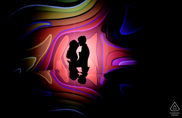 Engagement Photography for Romania - Portrait contains: silhouette, colorful, couple, spotlight