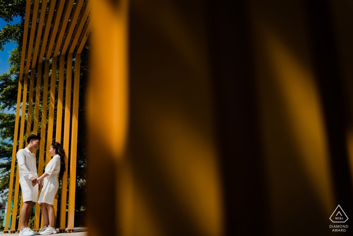Engagement Photography for Saigon, Vietnam with patterns and shadows Engagement Photography for Saigon, Vietnam - Image contains: patterns, shadows, couple, sunlight