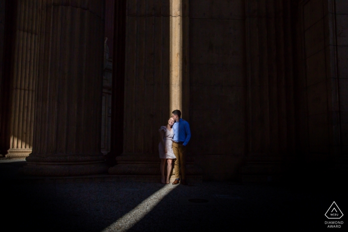 Engagement Photos from California - San Francisco - Portrait contains: couple, shaft, light, shadows