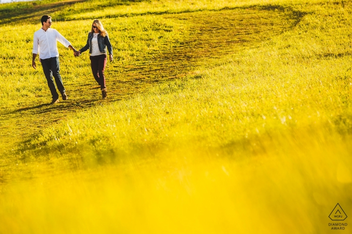 Engagement Photographer for Stroud Preserve, West Chester PA - Photographer said "Saw a sea of yellow and wanted them walk through it."