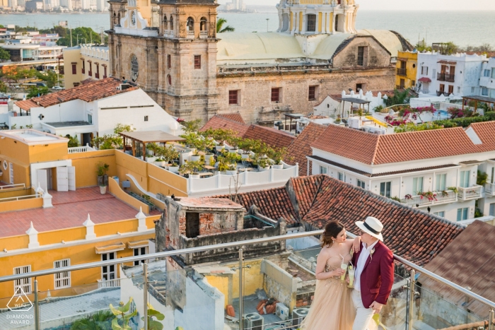 Photo by: <a href="https://www.wpja.com/photos/diamond-award-top-wedding-engagement-photographer/2552154">Maik Dobiey - Santiago de Surco Lima Engagement Portrait at a Rooftop bar overlooking Cartagena
