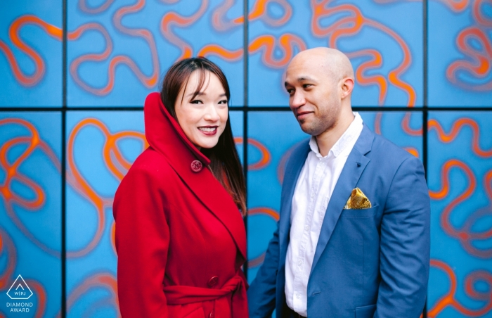 Photo by: <a href="https://www.wpja.com/photos/diamond-award-top-wedding-engagement-photographer/2552519">Gyula Lovaszi - Ealing London Tower Bridge Engagement Portraits in Red and Blue