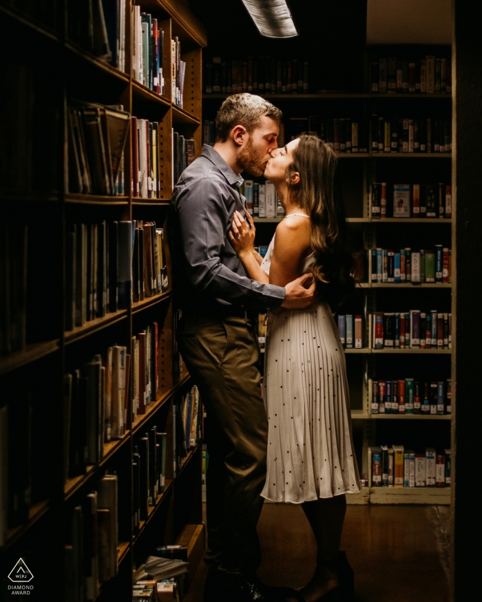 Photo by: <a href="https://www.wpja.com/photos/diamond-award-top-wedding-engagement-photographer/2554659">Kevin Wright - Attleboro Massachusetts Ames Library | Easton, MA pre-wedding photographer: this couple found the cutest corners for their library engagement session
