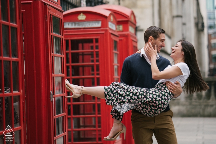 London, England engagement session with red phone booths 