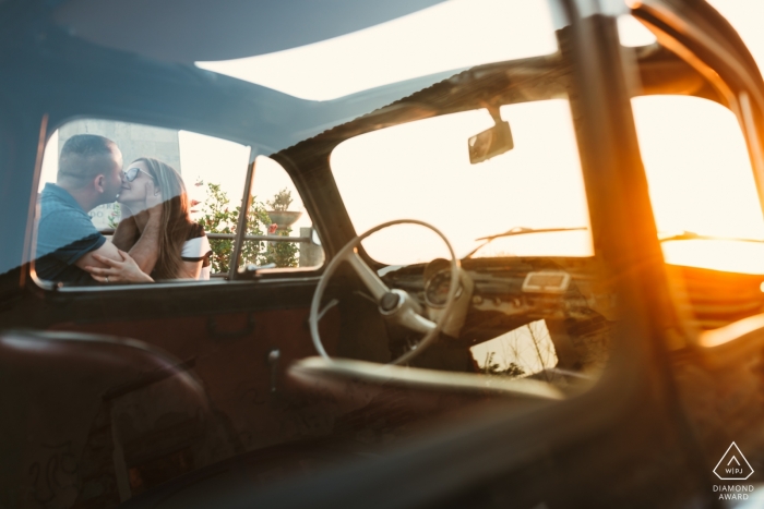 Photo by: <a href="https://www.wpja.com/photos/diamond-award-top-wedding-engagement-photographer/2555161">Danilo Muratore - Rosarno Reggio Calabria NICOTERA ( VV ) ENGAGEMENT PORTRAITS - Sunset Photo Session with a Car and a Couple