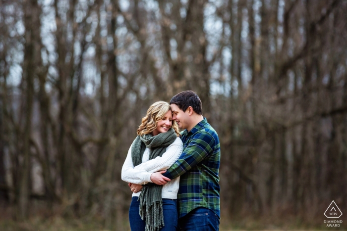 Photo by: <a href="https://www.wpja.com/photos/diamond-award-top-wedding-engagement-photographer/2556676">Michelle Arlotta - Milford New Jersey Frenchtown, New Jersey winter engagement session in the bare trees