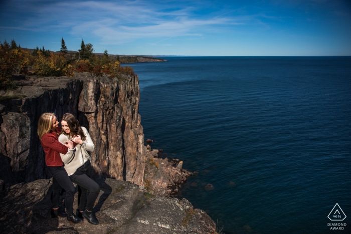 Photo by: <a href="https://www.wpja.com/photos/diamond-award-top-wedding-engagement-photographer/2557821">Penny McCoy - Columbia Heights Minnesota Duluth Couple on the cliff