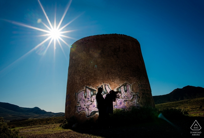 Photo by: <a href="https://www.wpja.com/photos/diamond-award-top-wedding-engagement-photographer/2558136">Eduardo Blanco - Águilas Murcia Sunset engagement portrait session with blue skies in Almería
