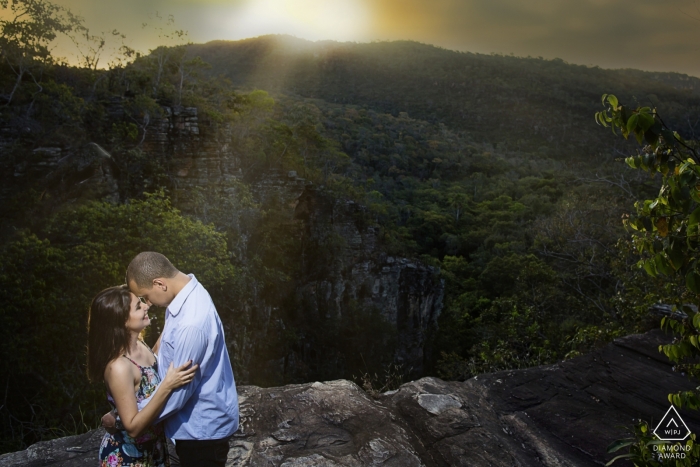 Photo by: <a href="https://www.wpja.com/photos/diamond-award-top-wedding-engagement-photographer/2560113">Claudia Amorim - Goiânia Goias - Pirenópolis pre wedding portrait shoot with a couple in the mountains at sunset