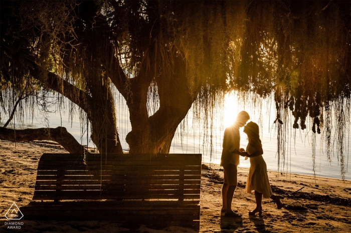 Photo by: <a href="https://www.wpja.com/photos/diamond-award-top-wedding-engagement-photographer/2560582">Kassio Silva - Aracruz Linhares, EspĂrito Santo, Brazil pre wedding portrait at the water during sunset.