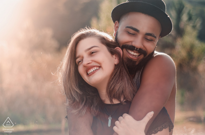 Photo by: <a href="https://www.wpja.com/photos/diamond-award-top-wedding-engagement-photographer/2560730">Lucas Coutinho - Nova Friburgo Rio de Janeiro Hotel Oberland, Nova Friburgo - RJ Portrait Photography | Couple having a nice warm hug in the sunlight
