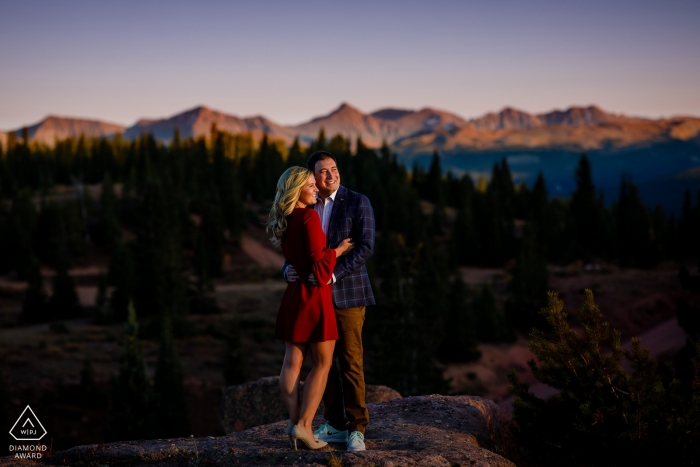 Photo by: <a href="https://www.wpja.com/photos/diamond-award-top-wedding-engagement-photographer/2562421">Trent Gillespie - Silverthorne Colorado Shrine Pass Photography of a Couple - Catching the last bits of light on top of Shrine Pass for their engagement session.