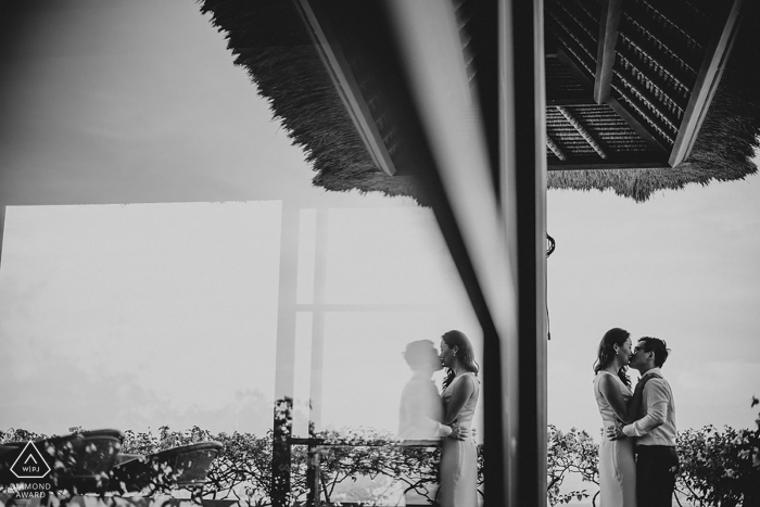 LongHouse Villa Jimbaran engagement shoot - Bali - Indonesia session with glass reflections.