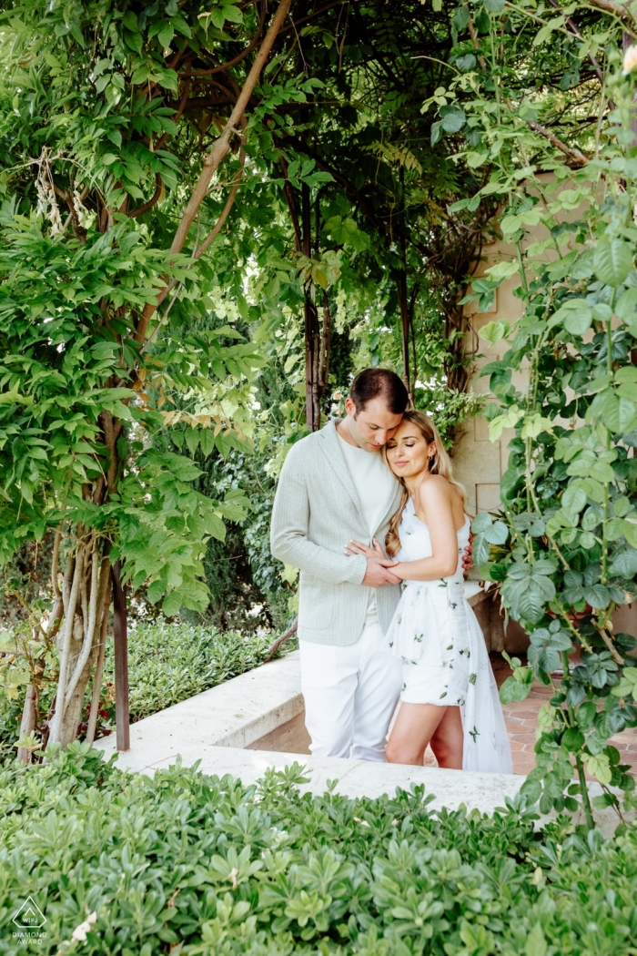 France Provence engagement session with lush, green plants in verticle