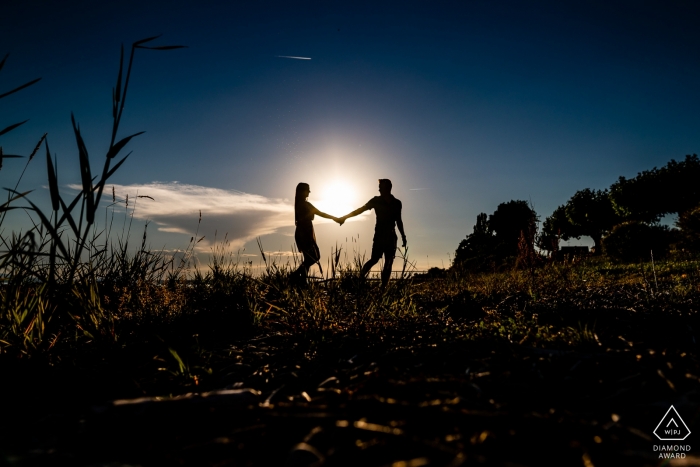 Hagnau Bodensee silhouettes of love - engagement photography at sunset with young couple.