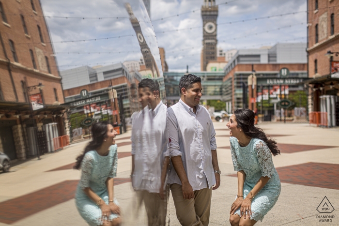 Camden Yard, Oriole Park, Baltimore, MD - Esta pareja está expresando alivio y emoción después de su sesión de fotos de compromiso de Camden Yard