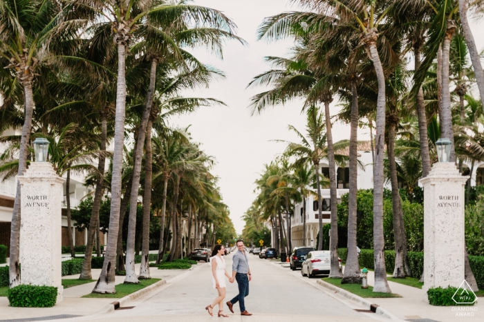 Photo by: <a href="https://www.wpja.com/photos/diamond-award-top-wedding-engagement-photographer/2563951">Lukas Guillaume - Miami Florida Couple walking down Worth Ave in Palm Beach, FL | Engagement Photography