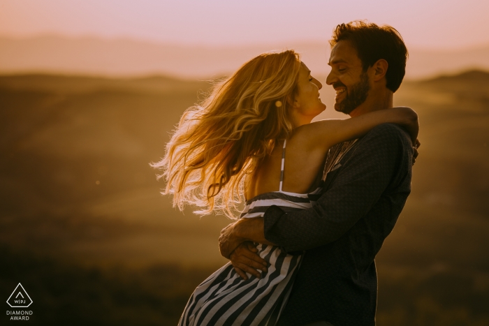 Arezzo, Tuscany, Italy engagement photo in the country and wind Arezzo, Tuscany, Italy engagement photographer: yes i want you