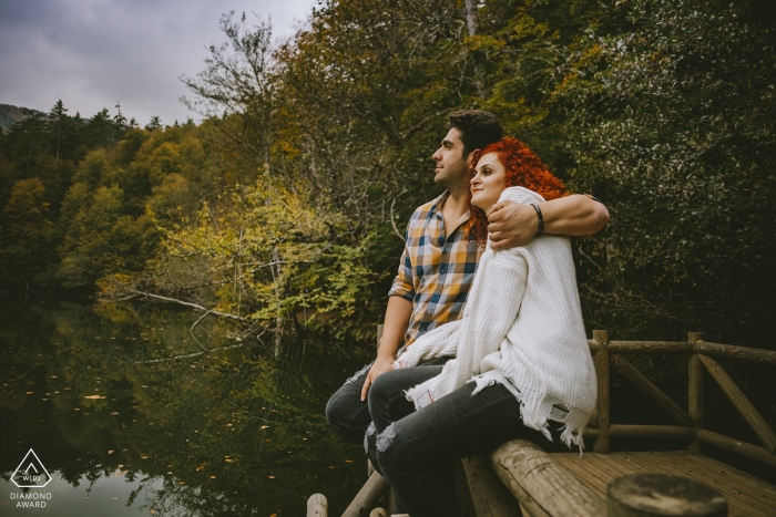Photo by: <a href="https://www.wpja.com/photos/diamond-award-top-wedding-engagement-photographer/2565726">Emre Nesli - İstanbul Istanbul Yedigöller/Bolu/Turkey | Portrait of a couple sitting on a natural balcony