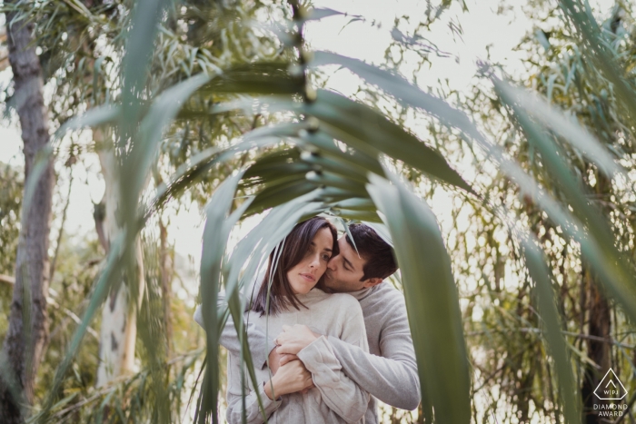 Napoli, Campania Engagement Photography - Portrait contains: palm, leaves, under, bridge, greenery