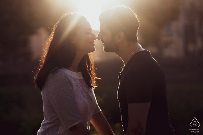 Pescia, Italy pre-wedding portrait of a couple about to kiss during the sunset