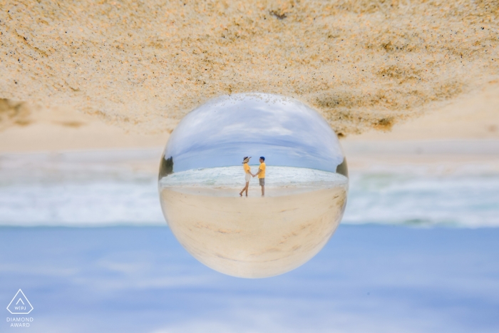 Phuket, Thailand Pre-Wedding Engagement Portraits with a glass ball sphere on the beach Phuket, Thailand Pre-Wedding Engagement Portraits : glass, ball, sphere, beach, prism, sand, couple, water, sky