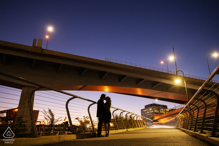 Photo by: <a href="https://www.wpja.com/photos/diamond-award-top-wedding-engagement-photographer/2569004">Simi Rabinowitz - Somerville Massachusetts North Point Park, Cambridge, Massachusetts Engagement Photography Session - Image contains: Silhouette of couple kissing at twilight