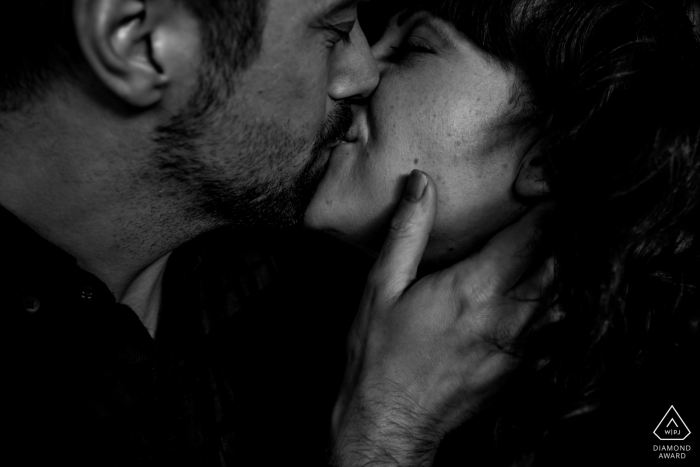 Drenthe intimate engagement couple portrait in black and white with a kiss.