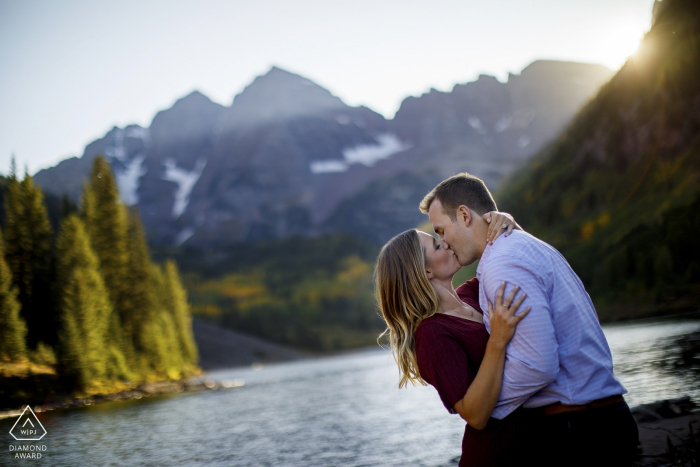 Photo by: <a href="https://www.wpja.com/photos/diamond-award-top-wedding-engagement-photographer/2571588">Justin Edmonds - Denver Colorado Maroon Lake, Aspen, CO portraits of a kissing couple near Maroon Lake during their engagement session.