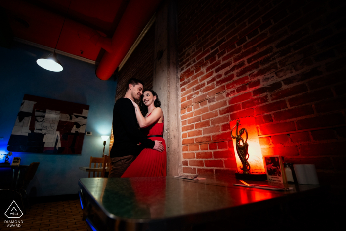 Blue Plate Restaurant, Edmonton, AB, Canada engagement portrait | It's you and me and this red light.