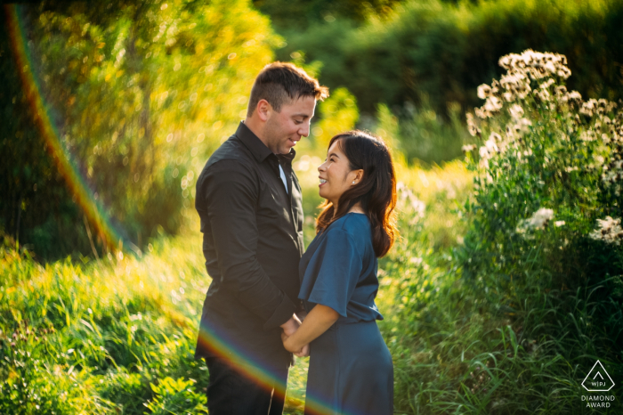 Edmonton , AB , Canada pre wedding portraits - A couple in love during the sunset light