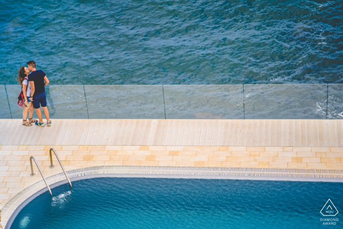 Pachino Tafuri Castle couple portrait of tenderness - Engagement Photography by the Pool