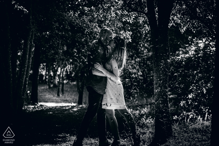 Orvieto - Italy pre wedding portraits during a kiss under the falling leaves