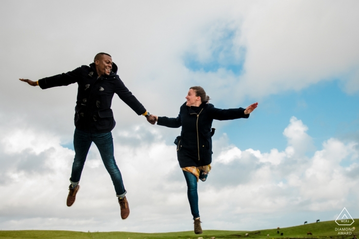 Ireland Engagement Shoot in the Clouds - they can Fly Cliffs of Mohr - Ireland Engagement Shoot in the Clouds | I can Fly!