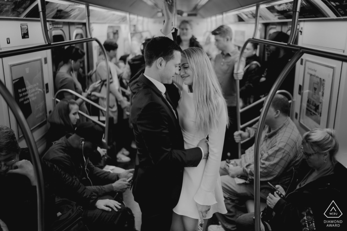 New York couple on subway during engagement photo session