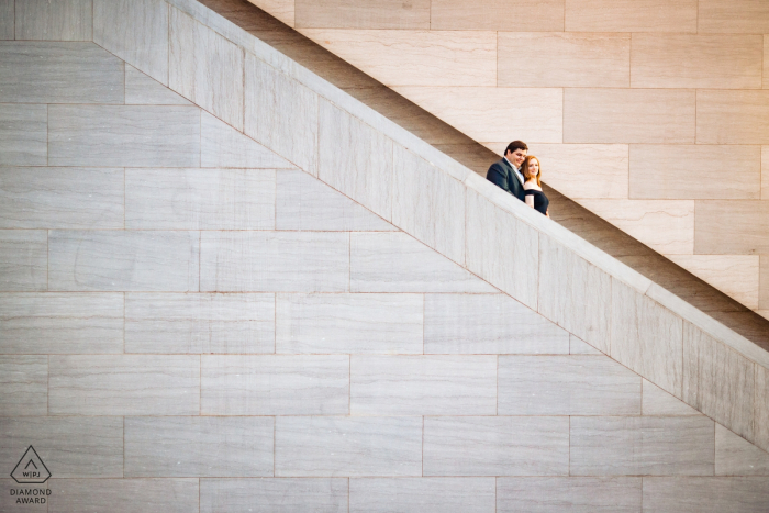 Photo by: <a href="https://www.wpja.com/photos/diamond-award-top-wedding-engagement-photographer/2576575">Anastasiia Polyakov - Arlington Virginia National Portrait Gallery, DC - A couple portrait on the escalator in the National Portrait Gallery