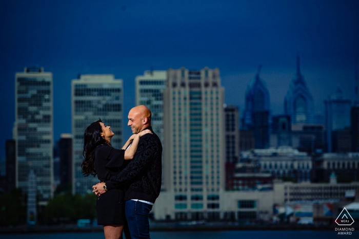 Camden Waterfront engagement portrait Session - Photographer: Saw the shot, made them laugh. 