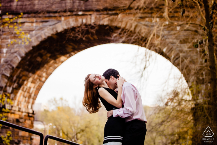 Boathouse Row engagement photographer: I saw the bridge, used a long lens and made it sexy. 