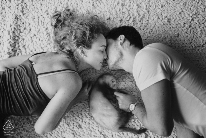 San Isidro couple portraits in-home on the floor.