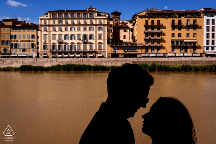 Silhouette couple portrait over River in Florence - Florence Italy city centre engagement shoot