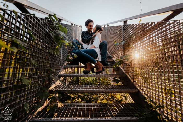 Couple Portrait Session in the Sunlight on some industrial stairs Essen, Germany Couple Portrait Shoot - Essen Pre Wedding Session in the Sunlight