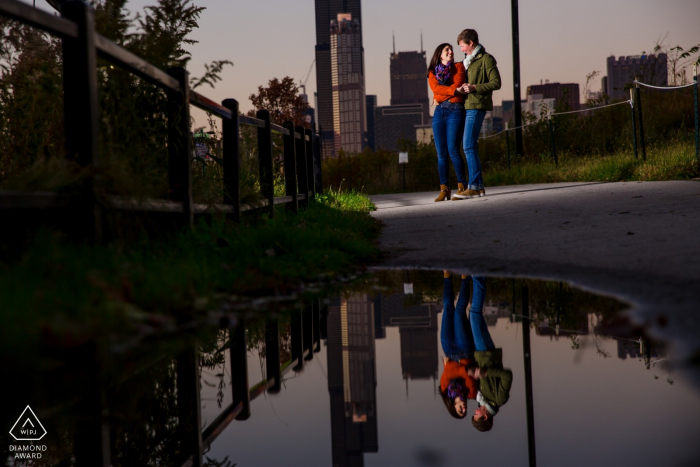 Photo by: <a href="https://www.wpja.com/photos/diamond-award-top-wedding-engagement-photographer/2579446">Victoria Sprung - Chicago Illinois Illinois - ping tom park couple and a puddle - Engagement Photo