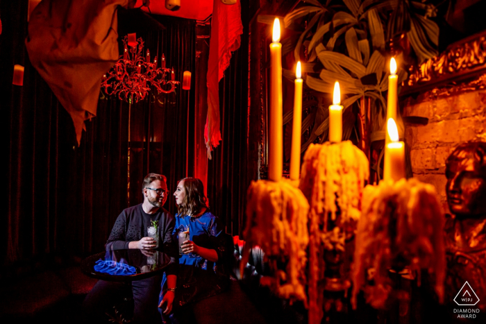 Photo by: <a href="https://www.wpja.com/photos/diamond-award-top-wedding-engagement-photographer/2579449">Victoria Sprung - Chicago Illinois king of cups, chicago couple in a bar for engagement session
