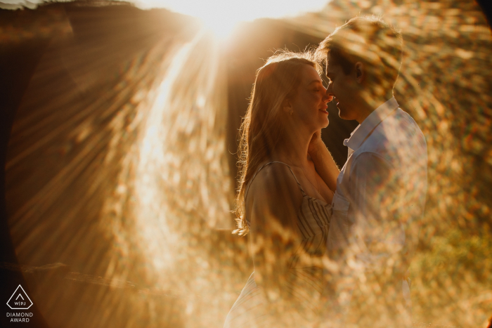 Rio Grando do Sul couple during engagement session with sun ring effect